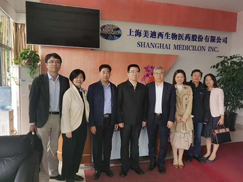 中国药科大学党委书记金能明与J9九游会老哥俱乐部首席执行官陈春麟博士